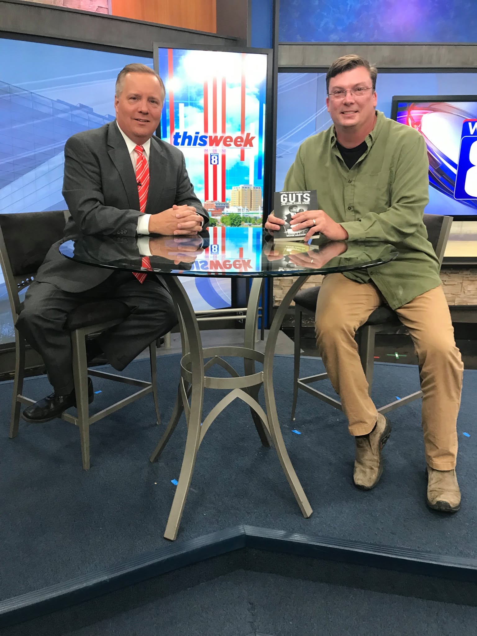 Devin with Jim Mertens on The Cities, holding Guts